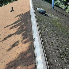 Removing Moss with Roof Shampoo in Middletown, NY 0